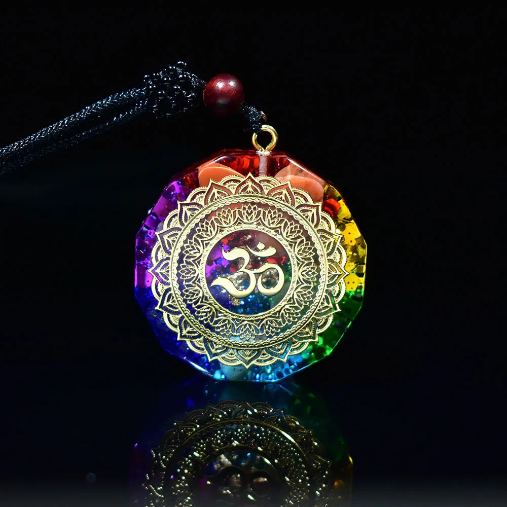 H38f97ba4befc40a99ae3fae7e75ededf2.webp 7 Chakra Orgonite Pendant Om Symbol Luminous Necklace Healing Crystals Energy Generator for Reiki Meditation Jewelry 1.38 inch