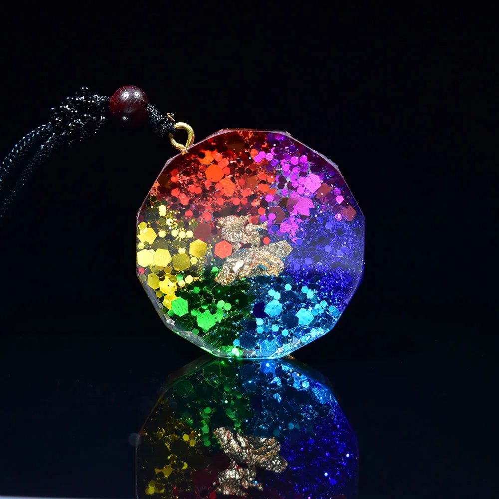 Hd92fc5d8327f476a84083a50d210b0746.webp 7 Chakra Orgonite Pendant Om Symbol Luminous Necklace Healing Crystals Energy Generator for Reiki Meditation Jewelry 1.38 inch