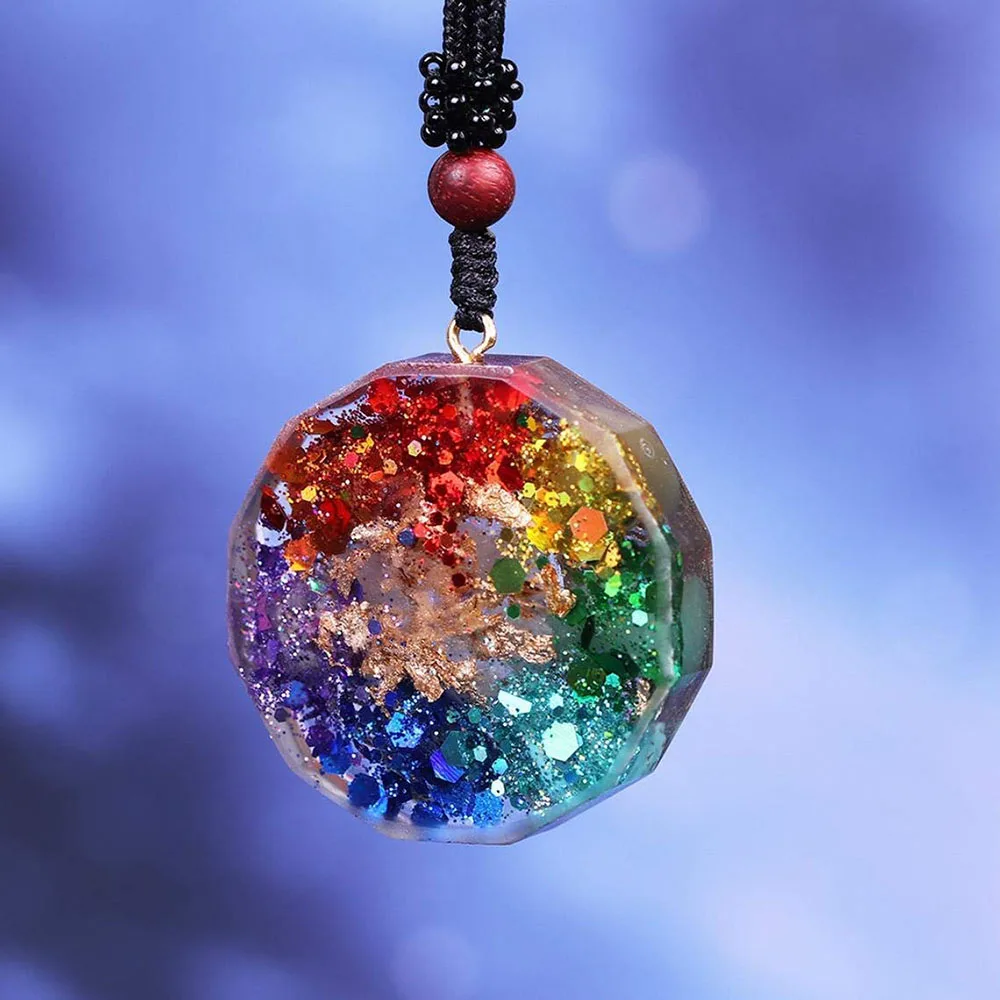 He2cefdfd96bf4723be54a75ed3ac65eeT.webp 7 Chakra Orgonite Pendant Om Symbol Luminous Necklace Healing Crystals Energy Generator for Reiki Meditation Jewelry 1.38 inch